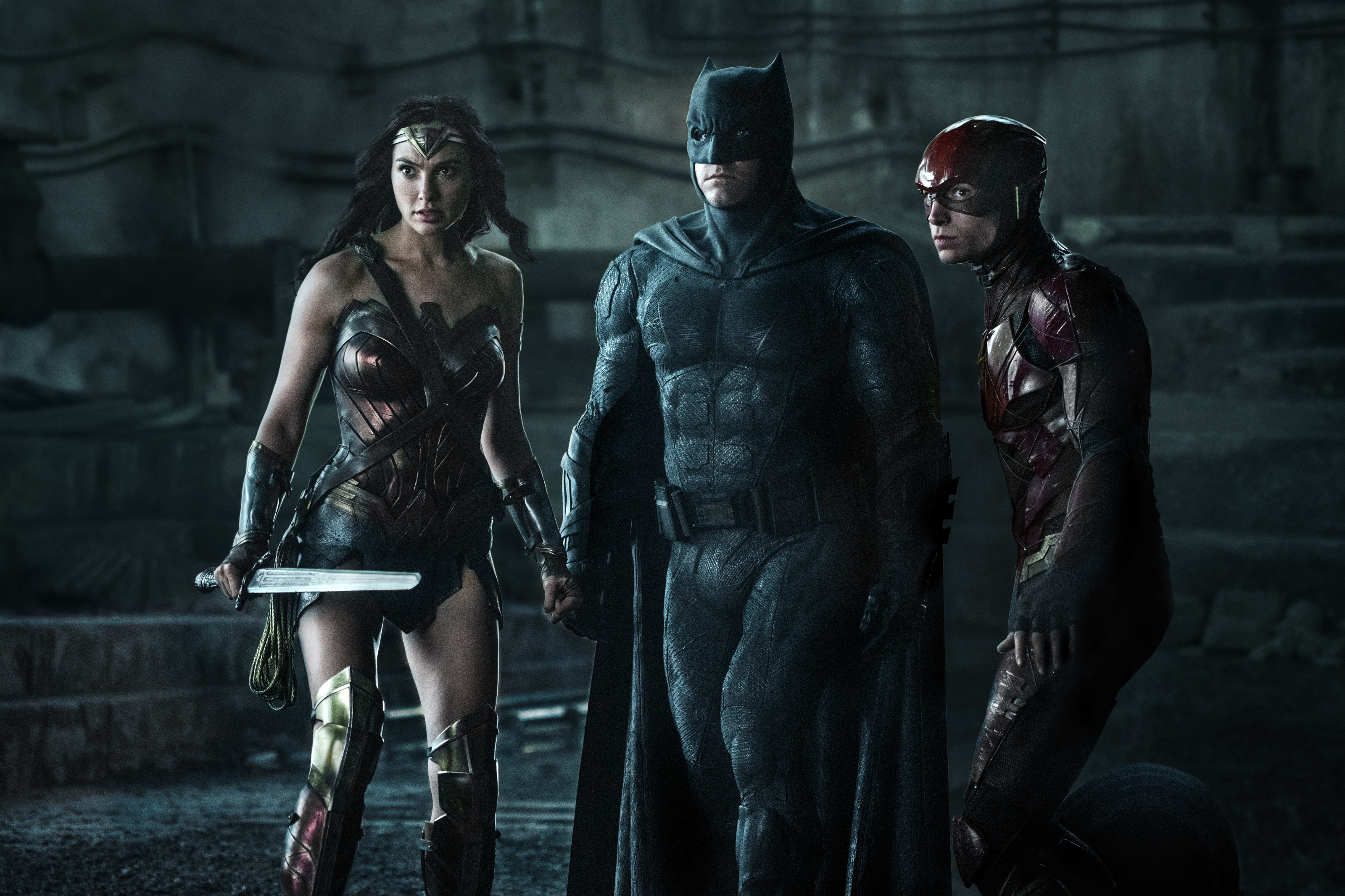 Photo: Gal Gadot, Ben Affleck and Ezra Miller in Justice League (2017).. Image Courtesy Warner Bros. Entertainment
