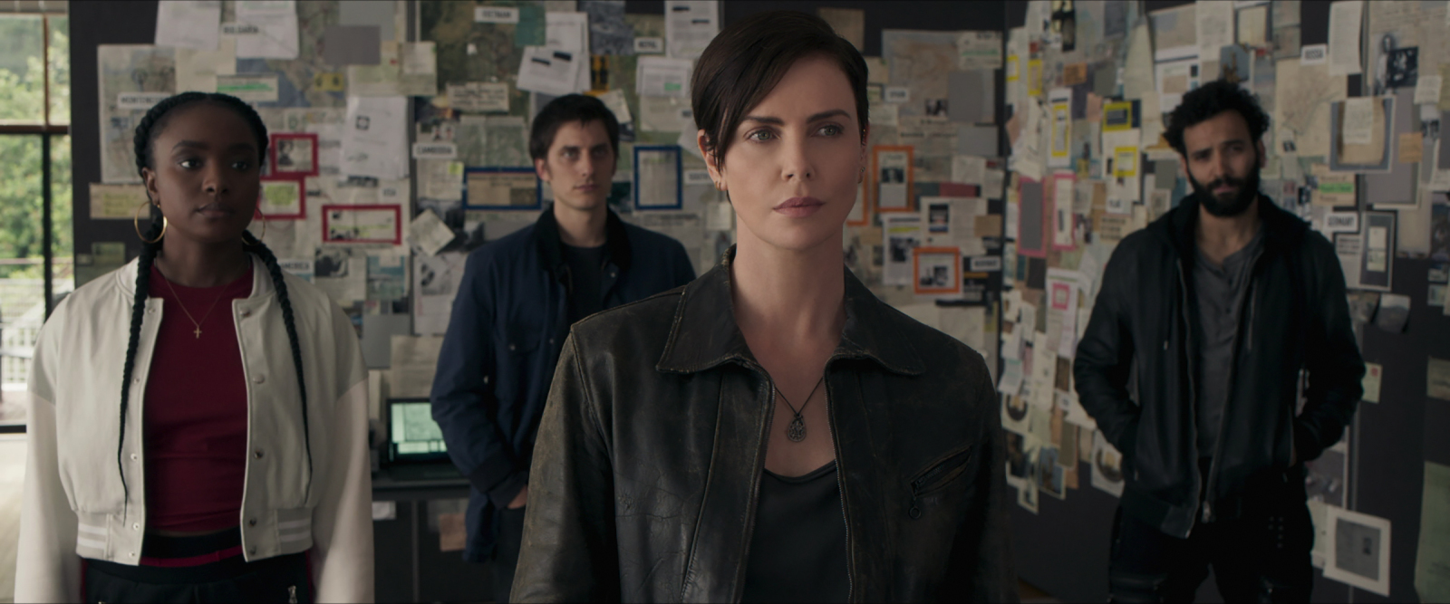 THE OLD GUARD (L to R) KIKI LAYNE as NILE, LUCA MARINELLI as NICKY, CHARLIZE THERON as ANDY, MARWAN KENZARI as JOE in THE OLD GUARD. Cr. Courtesy of Netflix/NETFLIX ? 2020