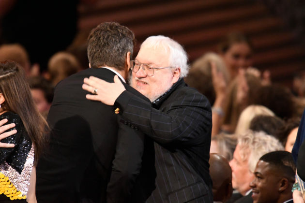 Sep 18, 2016; Los Angeles, CA, USA; George R. R. Martin (facing camera) congratulates David Benioff as ‘Game of Thrones’ wins the award for OUTSTANDING DRAMA SERIES during 68th Emmy Awards at the Microsoft Theater. Mandatory Credit: Robert Hanashiro-USA TODAY