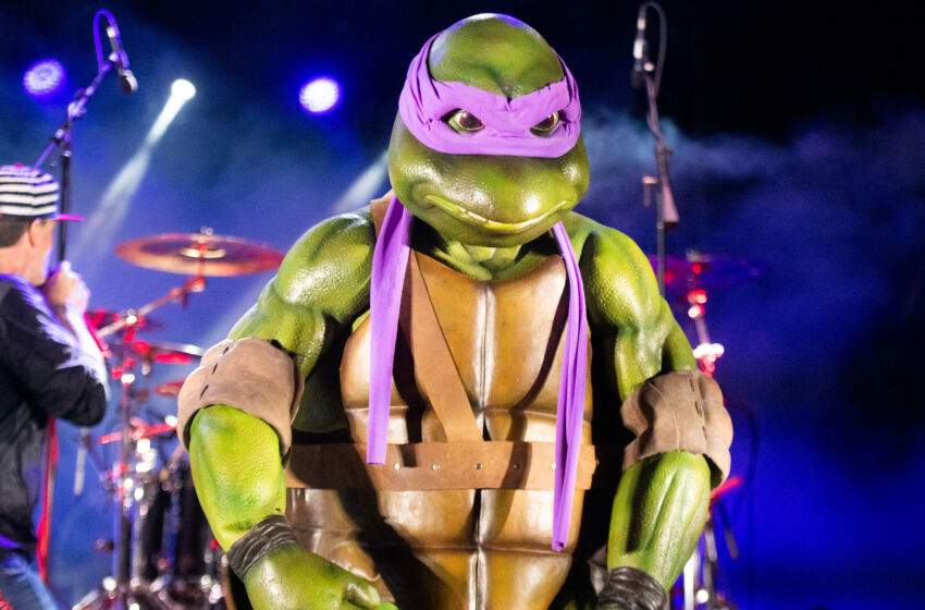 VENTURA, CALIFORNIA - JULY 24: The Teenage Mutant Ninja Turtles perform onstage with Vanilla Ice during the 9th Annual Tequila & Taco Music Festival at Ventura County Fairgrounds and Event Center on July 24, 2021 in Ventura, California. (Photo by Scott Dudelson/Getty Images)