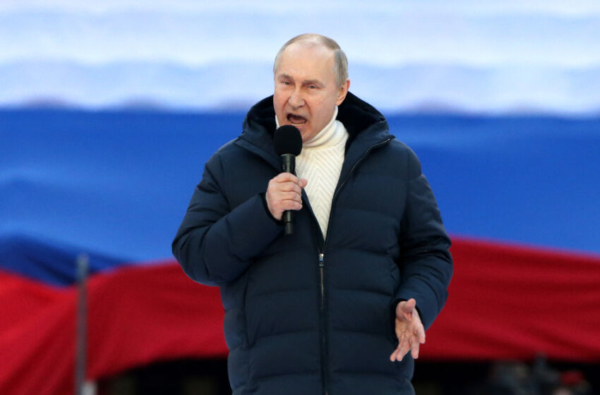 MOSCOW, RUSSIA - MARCH 18: (RUSSIA OUT) Russian President Vladimir Putin speaks during a concert marking the anniversary of the annexation of Crimea, on March 18, 2022 in Moscow, Russia. Thousands people gathered at Luznkiki Stadium to support President Putin, the annexation of Crimea and the conflict in Ukraine. (Photo by Getty Images)
